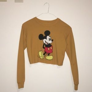 Orange Mickey Mouse cropped sweatshirt.